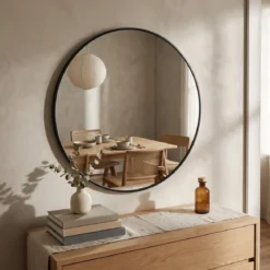 Okrągłe lustro ścienne w metalowej ramie, Ø 70 cm, czarne